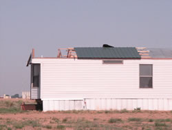 Image of damage around the Muleshoe area from storms on 25 May 2008. Click on the picture for a larger view. Photo by Jody James.