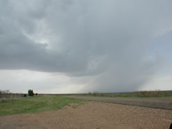 Picture of a storm located west of Roaring Springs on 27 May 2008. The image was taken just west of Roaring Springs, looking westward. Click on the image for a larger view. Photo by Gary Skwira. 