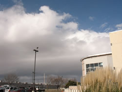 A pictured taken from the Science Spectrum as the band of clouds and precipitation approached during the late morning hours of December 8, 2009. Click on the image for a larger view. 