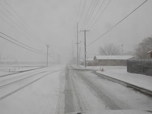 Picture of ice, sleet and snow impacts around the Lubbock area. Click on the picture for a larger view.