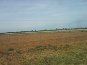 Damage incurred to a pivot irrigation system. Click on the image for a larger view. 