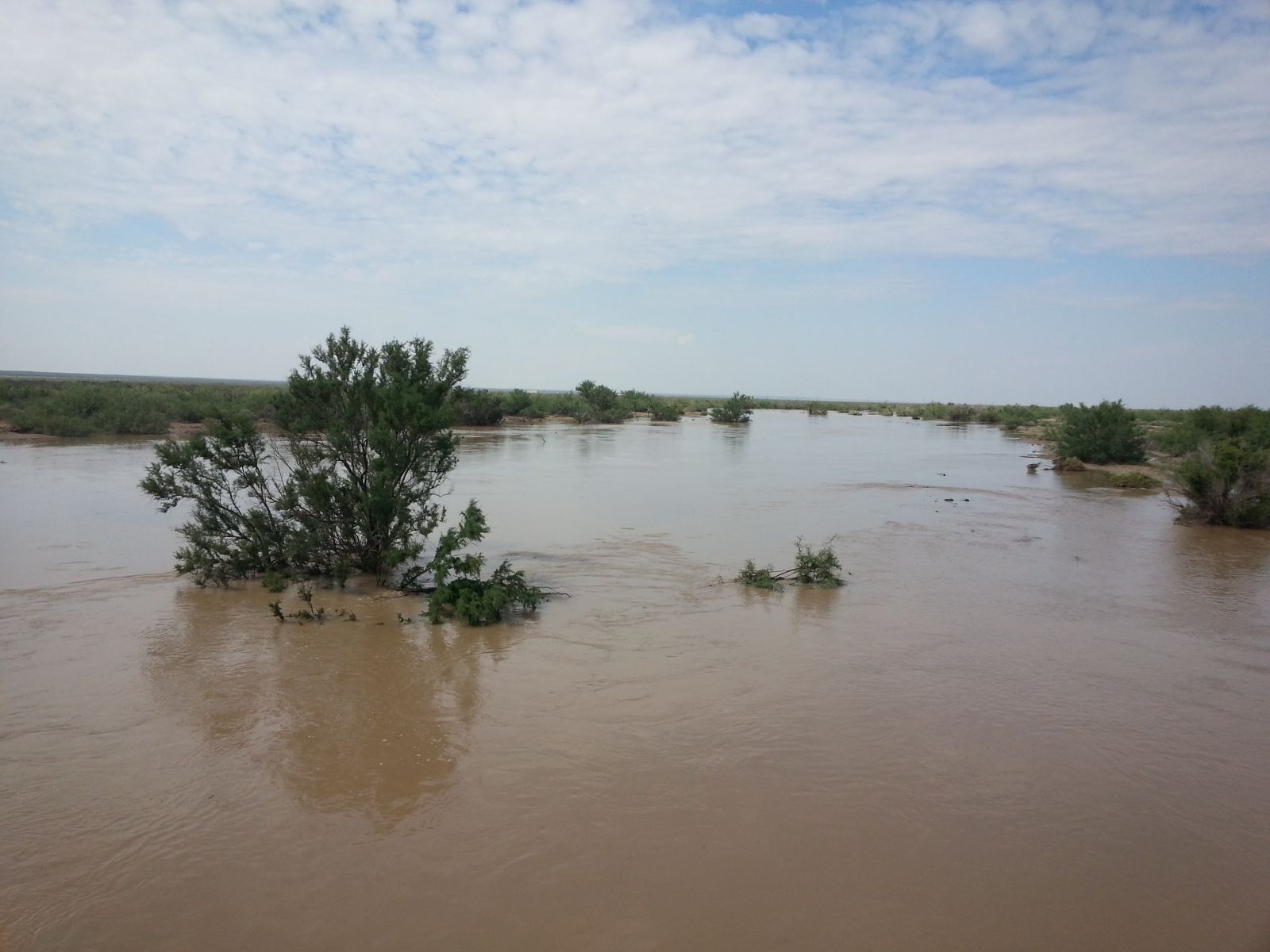 Several views of the swelling Pecos River between Red Bluff Reservoir and the town of Pecos on September 24, 2014.