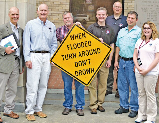 Some of the participants at the Turn Around, Donâ€™t DrownTM dedication at Pocahontas (Randolph County) on 06/22/2017 included (from left) Jim Belles, Meteorologist in Charge at the National Weather Service in Memphis, TN, Steve Drillette, Meterolologist in Charge at the National Weather Service in Little Rock, AR (WFO LZK), Randolph County Judge David Jansen, Warning Coordination Meteorologist Dennis Cavanaugh from WFO LZK, Northeast Arkansas Coordinator Anthony Coy, Randolph County Emergency Manager Bo Graham, and Senior Service Hydrologist Tabitha Clarke from WFO LZK. The photo is courtesy of the Pocahontas Star Herald.Â 