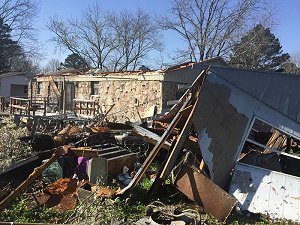 Structures were damaged near Higginson (White County).