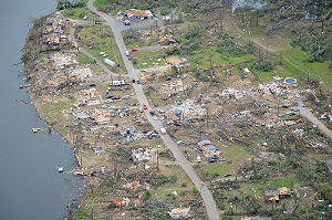 More houses were battered on the northeast side of town along Lake Conway.