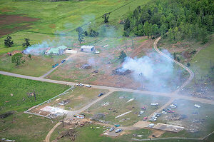 People were in the process of cleaning up and burning storm debris.