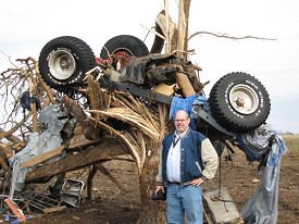 This jeep found itself in a tree.