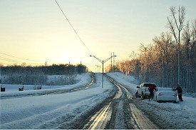 A motorist needed assistance, especially with a hill coming up along Brockington Road.