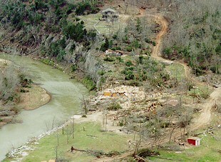 A house was destroyed 3.5 miles southwest of Allison (Stone County) along South Sylamore Creek.