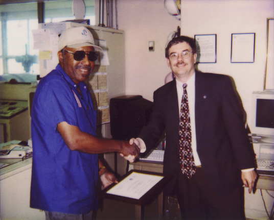 photo of Chevron Pipeline cooperative observer and National Weather Service staff