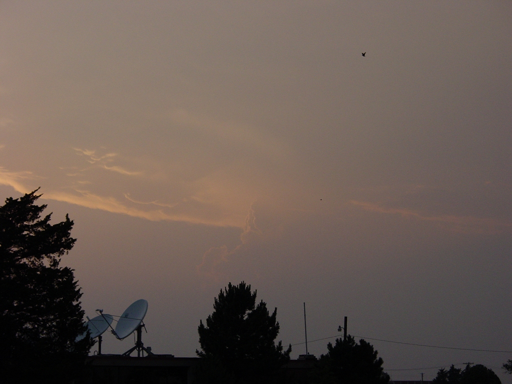 View looking to the northwest from the NWS Norman forecast office just after sunset during the evening of May 29, 2004. The supercell thunderstorm that produced multiple tornadoes is in the middle of the photo.