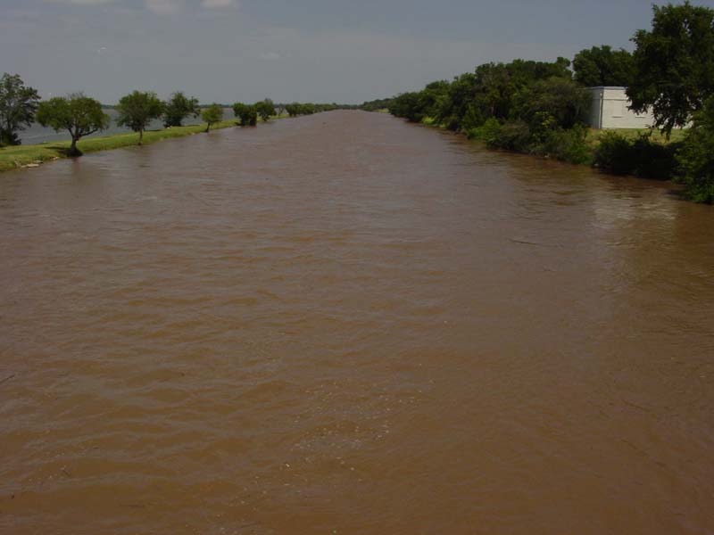 The Overholster Dam Spillway full of water.