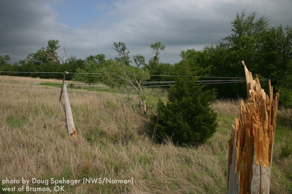 Utility pole broken and tree damage northwest of Braman, OK