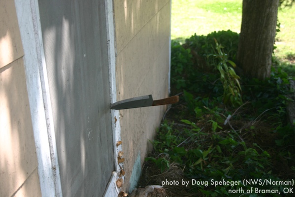 Knife embedded in a window frame north of Braman, OK