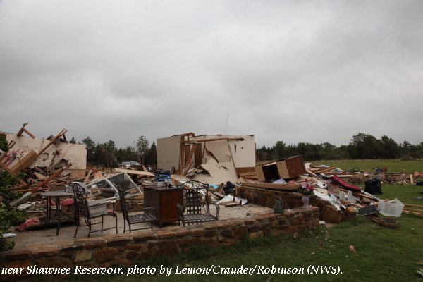 Home damage west of Shawnee, OK.