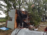 A mobile home toppled by an EF0 tornado that hit near Grand Ridge in Jackson County, FL on November 17, 2014.