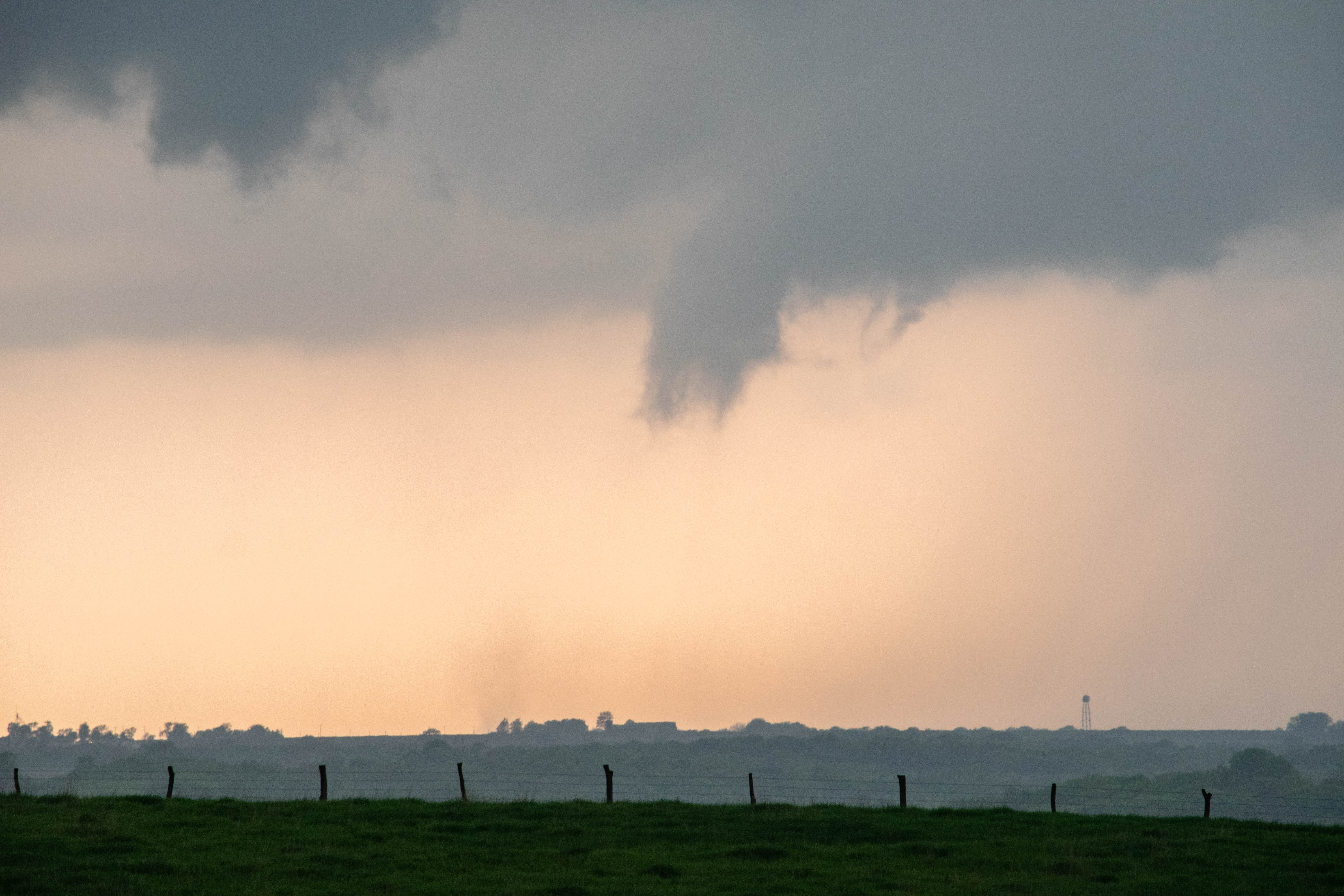 Tornado with dust kicked up underneath