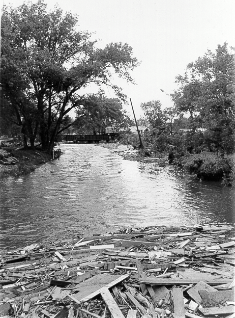 Debris and damaged bridge, Rapid Creek