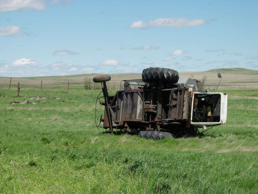 Damage to Gleaner combine (rolled a few times)