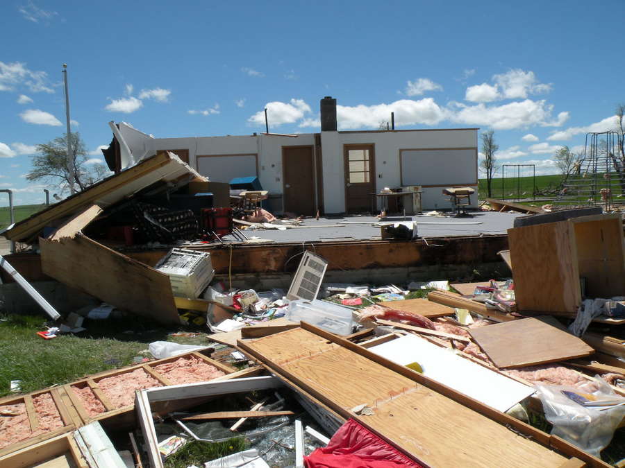 Destruction of Progress School (chimney helped interior walls remain standing)