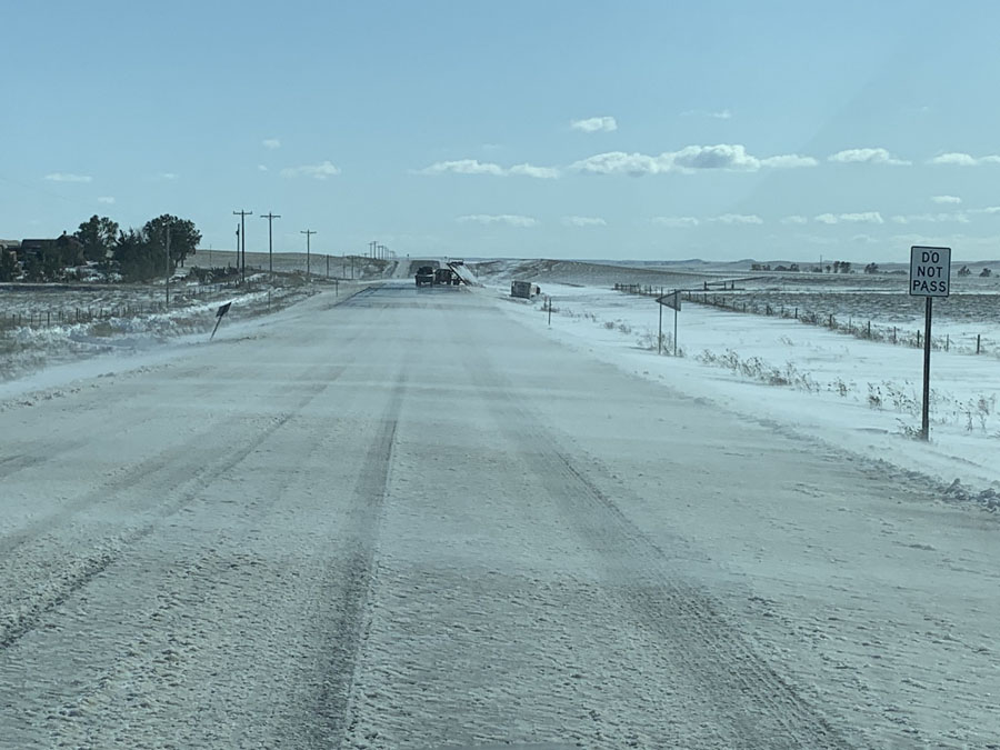 Snow Blowing across the Road