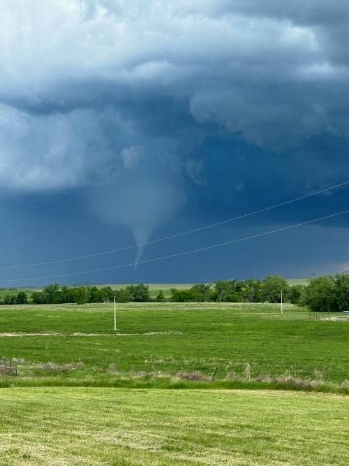 A tornado over an open field near Faith, South Dakota